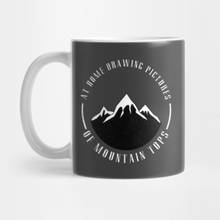 At home drawing pictures of mountain tops Mug